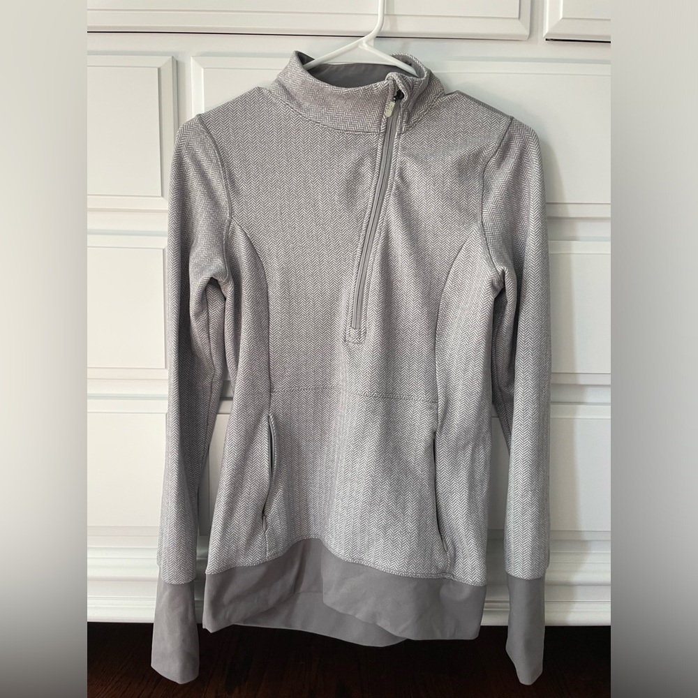1/4 zip. Light weight stretchy pullover